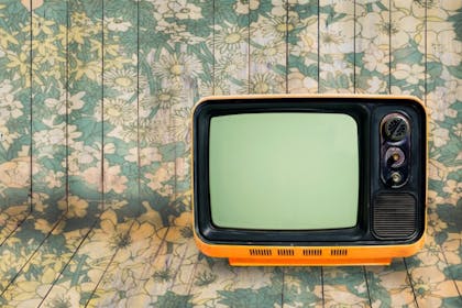 old television on patterned background