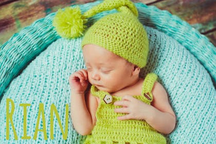 baby in green hat