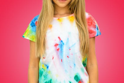 Young girl wearing tie dye t-shirt
