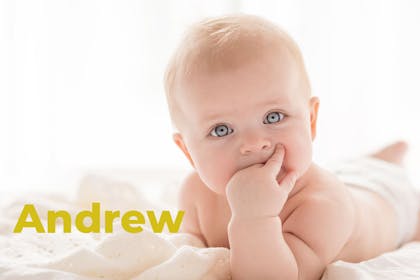 Baby with hand in mouth. Name Andrew written in text