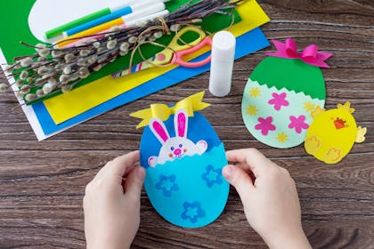 Paper pouch envelopes made to look like Easter eggs with bunny and chick inside