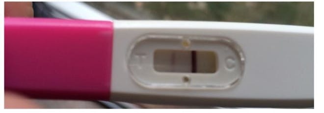 Faint positive result showing up on a pregnancy test