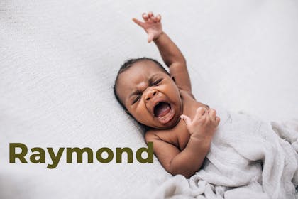 Baby yawning with arm stretched in air. Name Raymond written in text