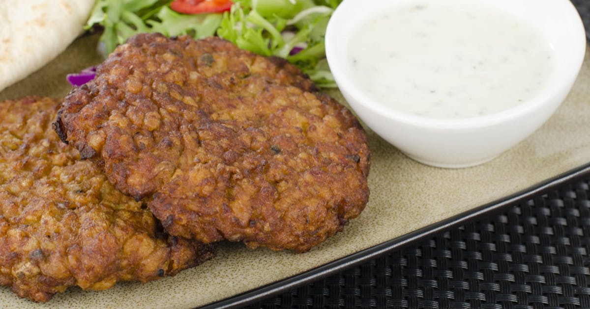 Minted lamb burger with potato wedges & Greek salad recipe - Netmums