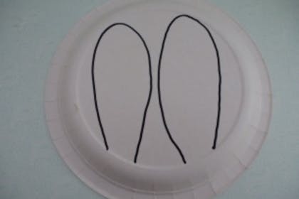 Paper plate with ears drawn on