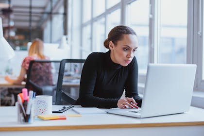 Woman working at her desk