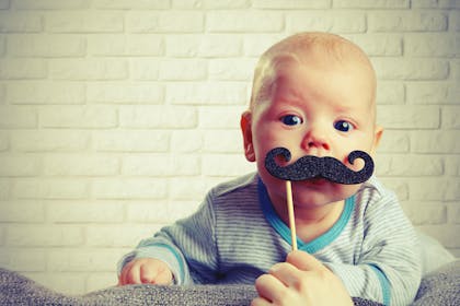 baby boy with comedy moustache