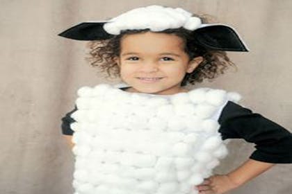 Little girl dressed as a sheep