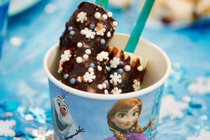 Chocolate covered banana on stick in Disney Frozen pot