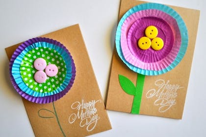 Homemade Mother's Day card with a flower made from cupcake liners and buttons
