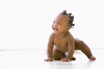smiling baby in nappy