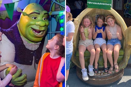 Shrek and child at Shrek's Adventure | Girls sitting together