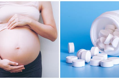 pregnant woman's bump and a tub of pills