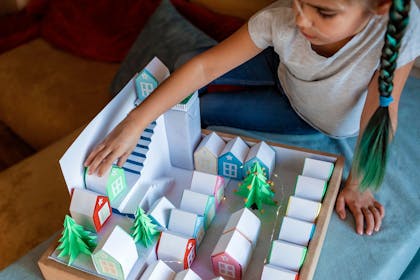Child playing with a homemade advent calendar