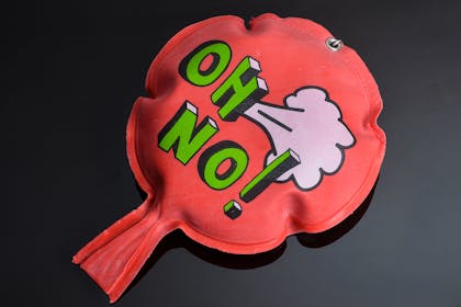 Pink whoopee cushion that says 'Oh no'