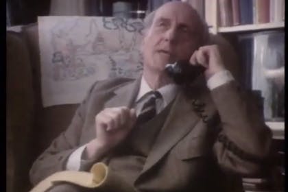 Old man talks on phone in vintage Yellow Pages advert 