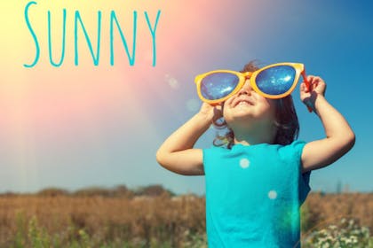 child wearing large glasses - Sunny baby name