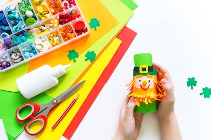 Leprechaun craft made out of old toilet roll tube and coloured paper