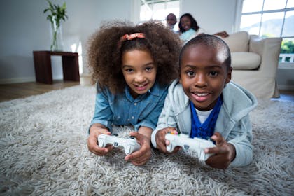 Two children playing video games