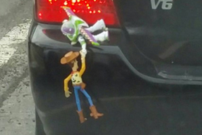 buzz and woody on car
