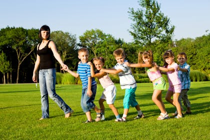 Children in a conga line