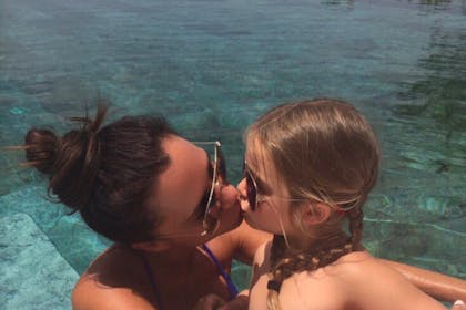 Victoria Beckham Harper kiss