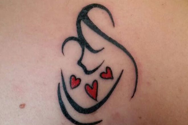 Outline mother cradling baby tattoo