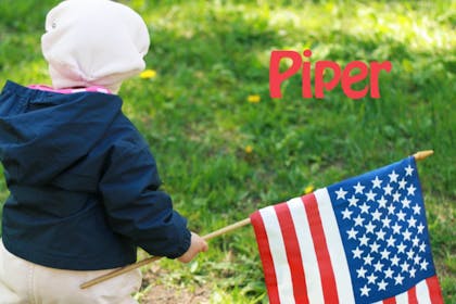 baby holding american flag