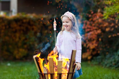 Girl roasting marshmallows 