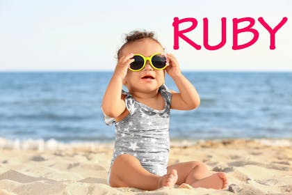 Baby girl on beach - Ruby
