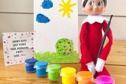 Elf on the Shelf painting a picture