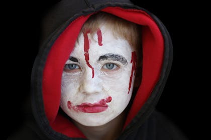 Halloween face paint for a gory ghost