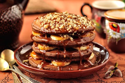 13. Chocolate pancakes with bananas, caramel and walnuts