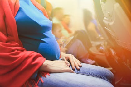 A pregnant woman on an aeroplane 