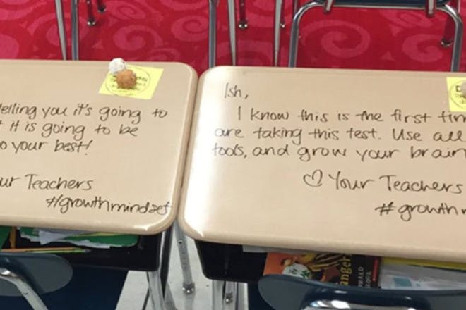 Teachers write good luck messages on pupils' exam desks - Netmums