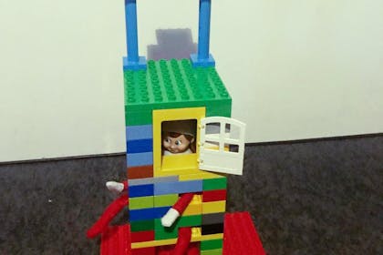 Elf in a duplo house