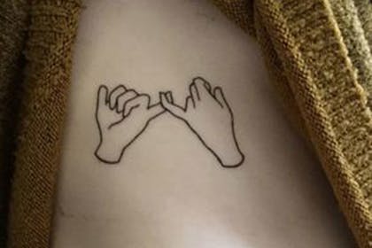 Linked finger tattoos