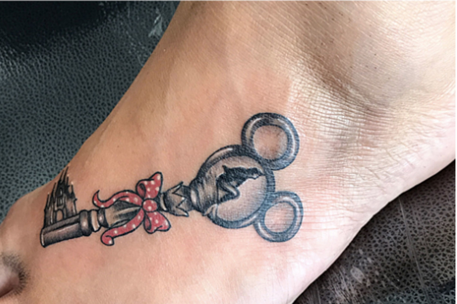Disney key tattoo with all my favorite princesses Tattoo by Jessica Cacho  in Orlando FL Fallen Sparrow Tattoo  Disney key tattoo Disney tattoos Key  tattoo