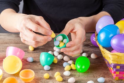 Filling plastic Easter eggs with Mini egg treats