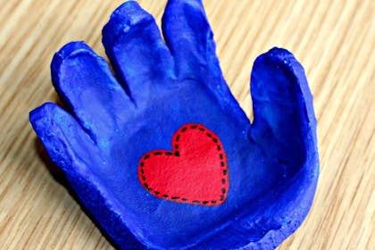 Blue with red heart child's handprint dish made from salt dough clay