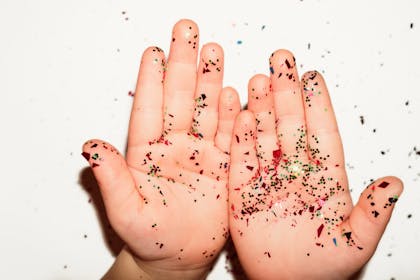 Hands full of glitter