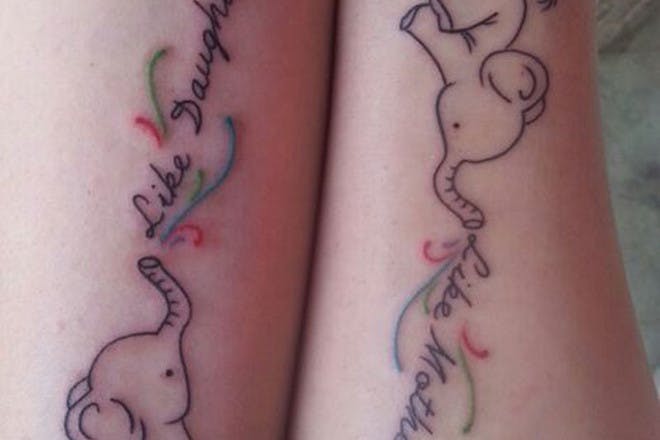 Matching mother daughter elephant tattoo