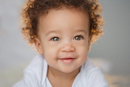 Mixed race baby smiling