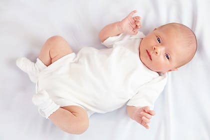 three week old abby in white babygro