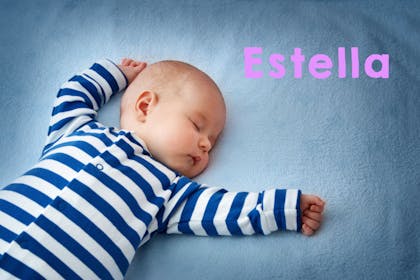 Sleeping baby in blue striped pyjamas