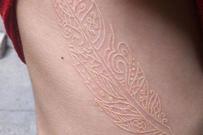 White feather tattoo