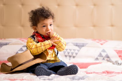 Little boy dressed as Woody from Toy Story