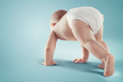 baby crawling in nappy