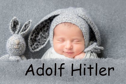 A baby sleeping, with the name 'Adolf Hitler' written in text