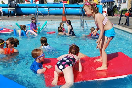 Children playing in swimming pool